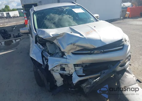 2014 Ford Escape Titanium z USA, uszkodzony, nr VIN 1FMCU9J92EUA53779